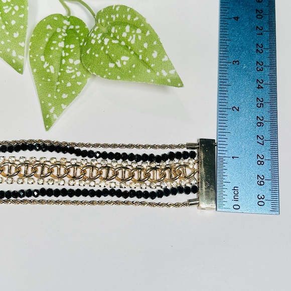Gorgeous Wide bracelet featuring gold tone chains, rhinestones and beads - Picture 8 of 10